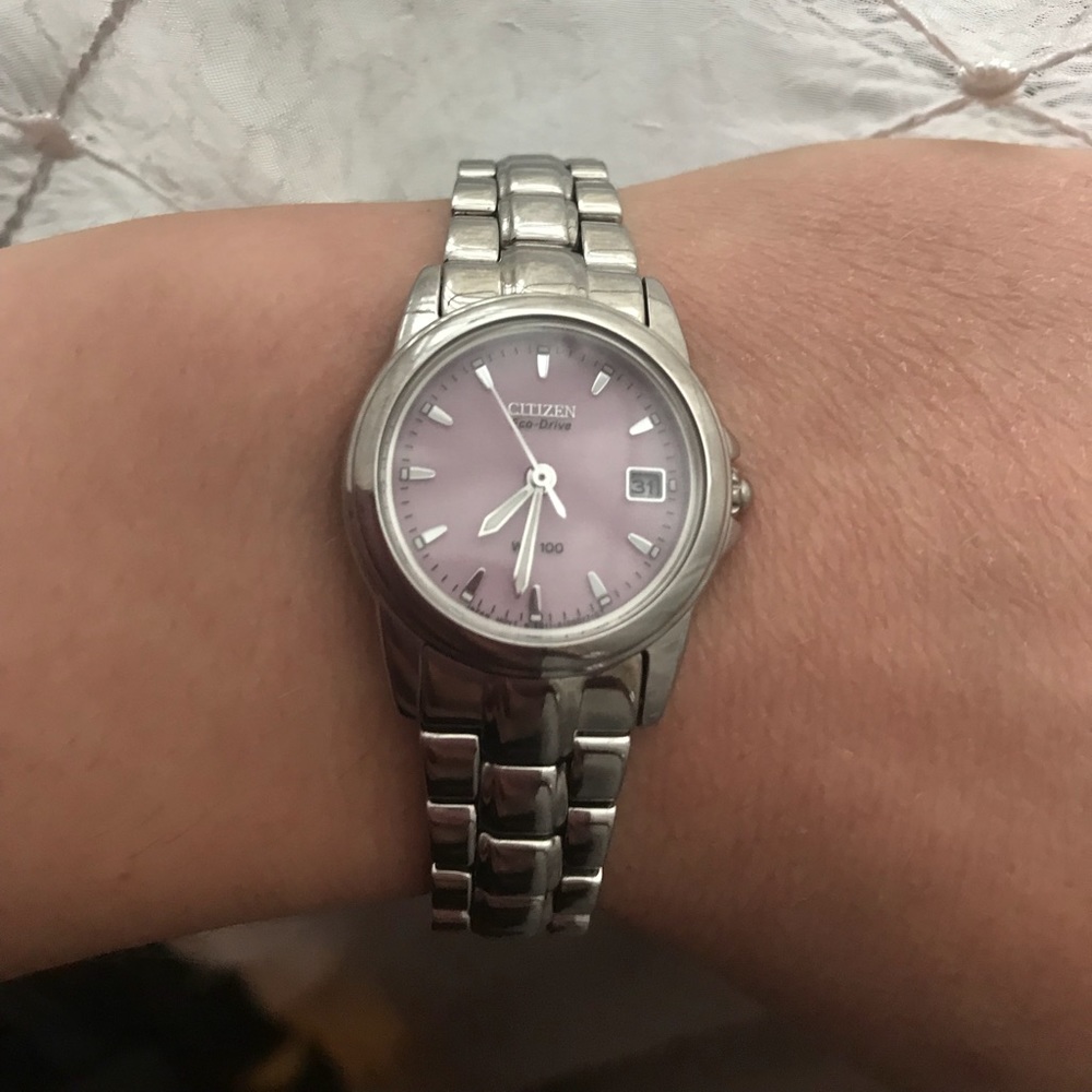 Citizen Women’s eco drive pink face watch.